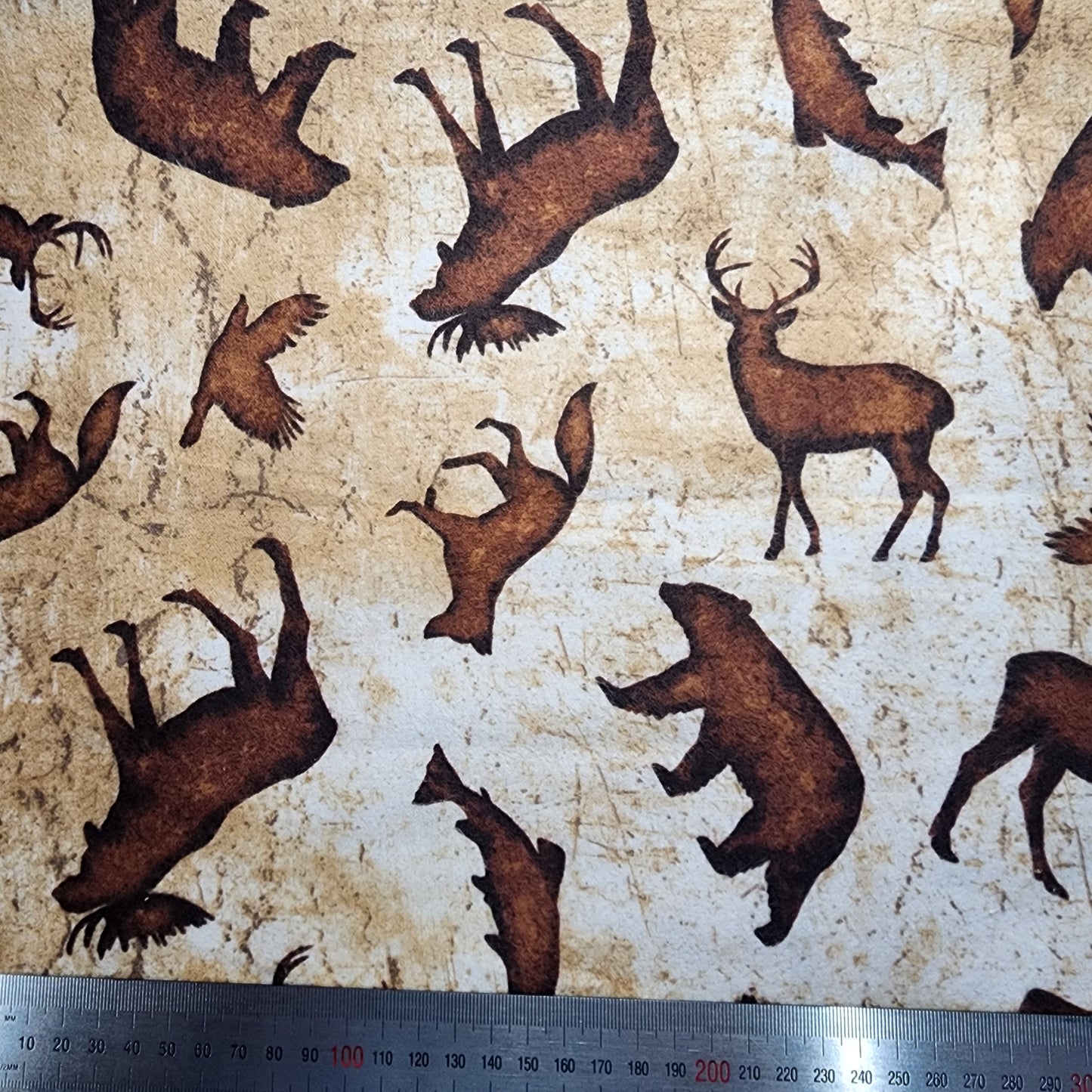 Clothworks - Robin Davis Studio designs - Brown and Cream Wildlife design - 100% cotton Flannel fabric - You’ve Got Me In Stitches